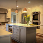Beautiful Center Island with Copper Pendant Lights