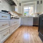 Brushed Gold Cabinet Hardware with Crisp White Cabinetry