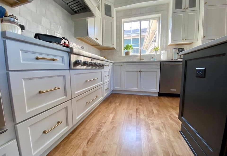 Brushed Gold Cabinet Hardware with Crisp White Cabinetry