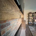 Vintage Brick Entrainment Wall Paired with Reclaimed Wood Mantle