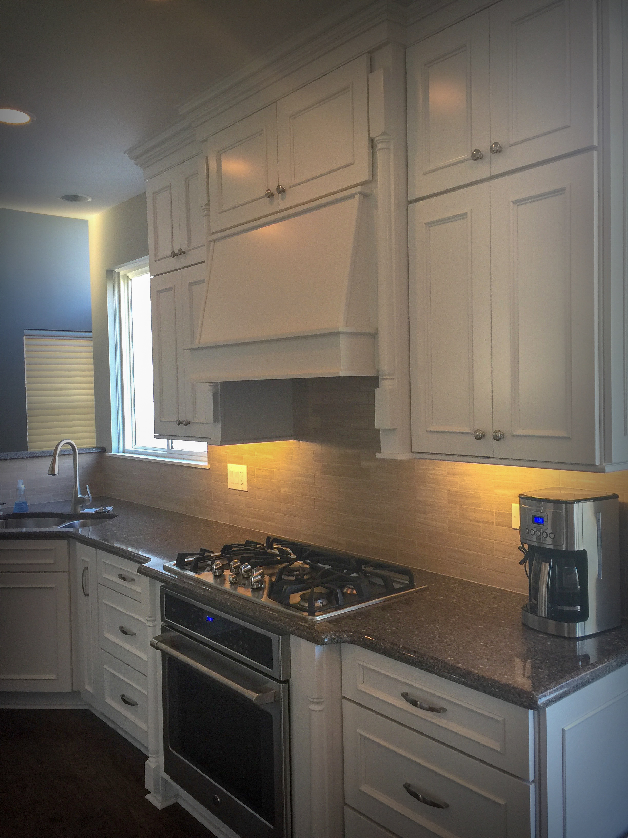 Remodeled Kitchen With White Cabinets