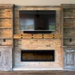 Beautiful Custom Entrainment Center Featuring Wood and Brick Textures