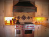 Chefs Kitchen With Custom Backsplash