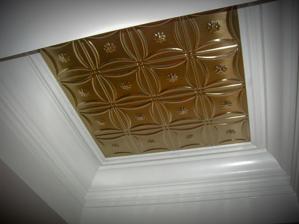 Tin ceiling panels in coffered space