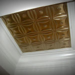 Tin ceiling panels in coffered space