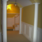 Archways with raised panels in Basement Hall