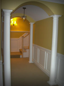 Archways with raised panels in Basement Hall